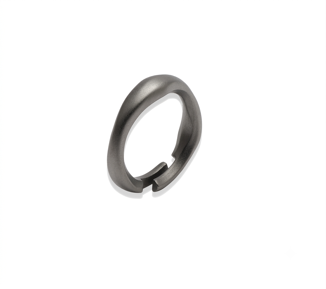 Anello Sintesi Pura in bronzo titanio, collezione Essenza di Tiziana Piola